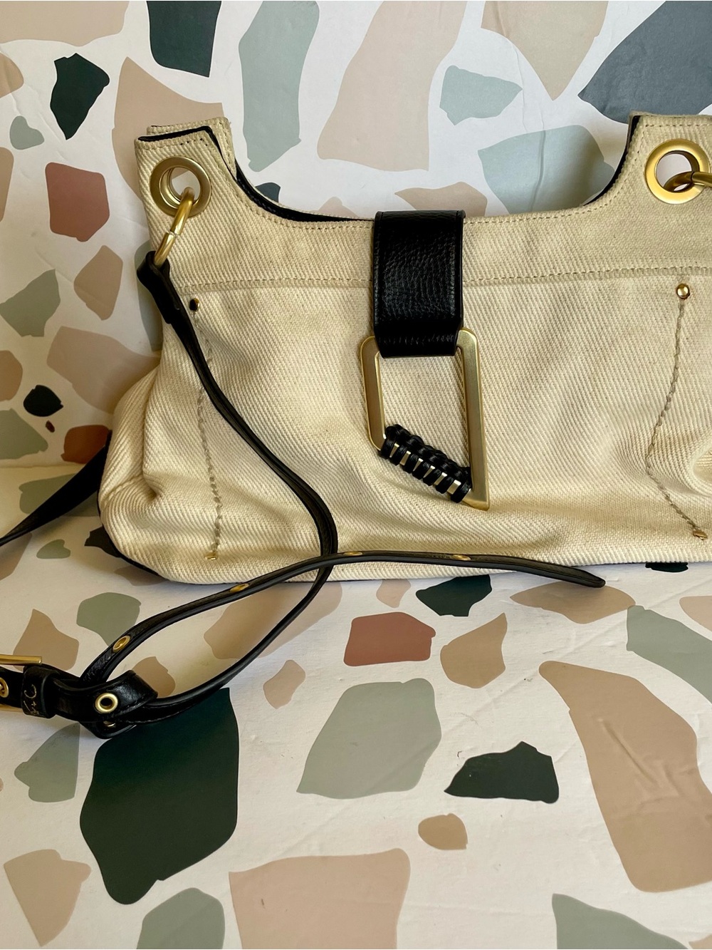 Foley + Corinna Cream Canvas Shoulder Bag with Black Trim and Gold Hardware